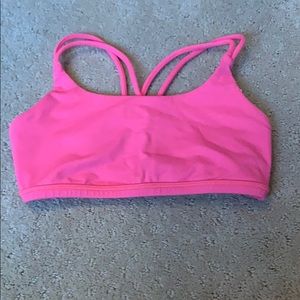 this is a bright pink ivivva crop top